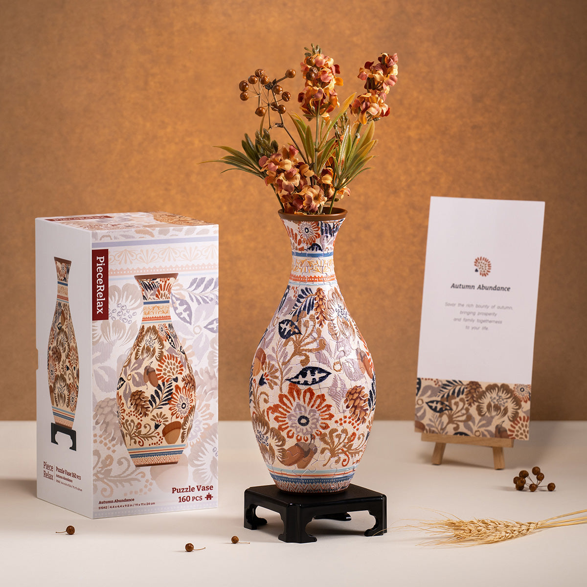 PieceRelax | Puzzle Vase - Immerse yourself in the beauty of fall. This stunning puzzle vase captures the essence of autumn with its intricate floral details and warm, earthy hues. A unique, handcrafted decoration that brings seasonal charm to your home. With PieceRelax, you’ll always get there.